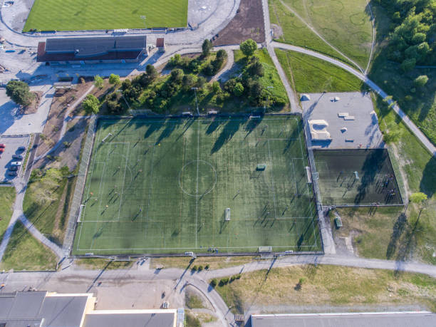 istock Aerial view over a soccer playing field 963089104