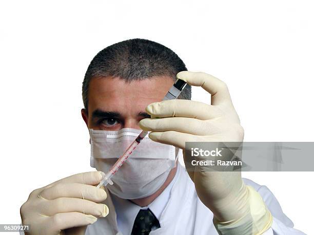 Doc Filling A Syringe Stock Photo - Download Image Now - Adult, Attitude, Blue-collar Worker