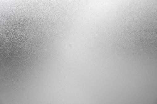 Silver background white texture light color foil glitter sparkle shiny metal wall dust paper luxury elegant abstract concept bright cardboard backdrop pattern