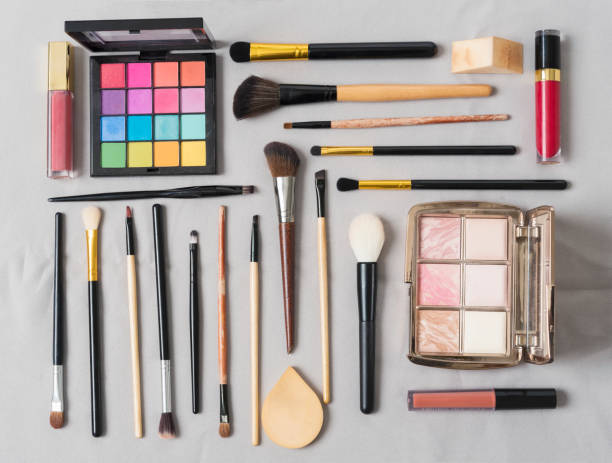 istock Makeup cosmetics brushes and accessories on white background. Top view. Flat lay. beauty concept. 963094000