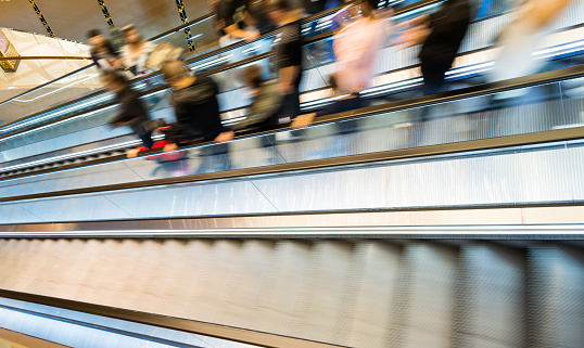 A group of people on escalator