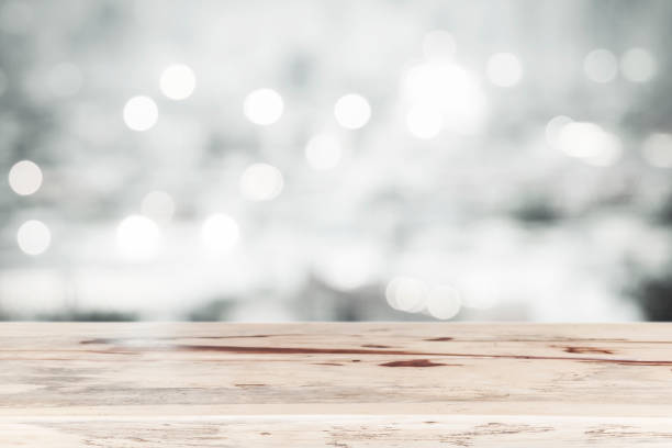 istock Empty wood table top for show product with blurred light bokeh background. Picture for add text message. Backdrop for design art work. 963096884