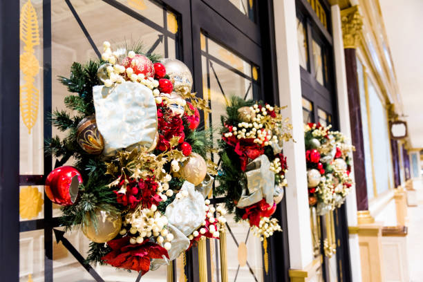 istock Christmas wreaths on glass door 963097276