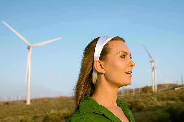 istock Woman infront of Wind Turbines 96309763