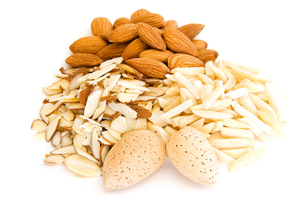 istock Piles of whole, sliced and silvered almonds on white 96309941
