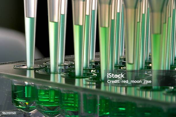 Robot Microfluidics Dispensation Stock Photo - Download Image Now - Genomics, Laboratory, Green Color