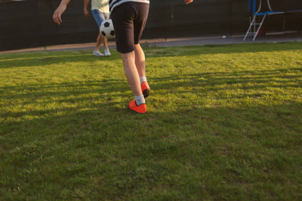 istock Family Playing Soccer 963103992