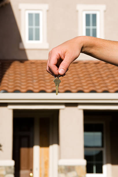 istock Concept - Real Estate: House and key 96310404