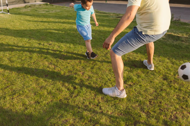 istock Family Playing Soccer 963104942