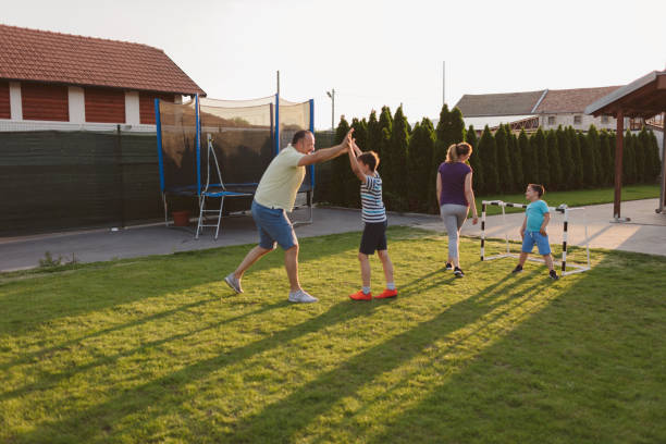 istock Family Playing Soccer 963105238