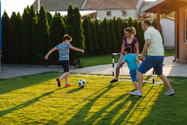 istock Family Playing Soccer 963107722