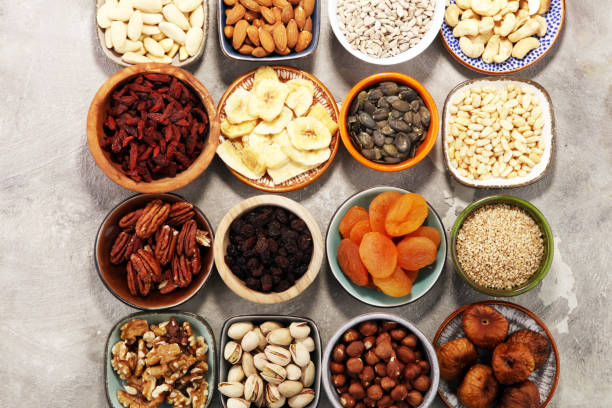 istock Composition with dried fruits and assorted healthy nuts 963111178