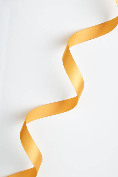 istock Gold ribbon on a white background. 963116900