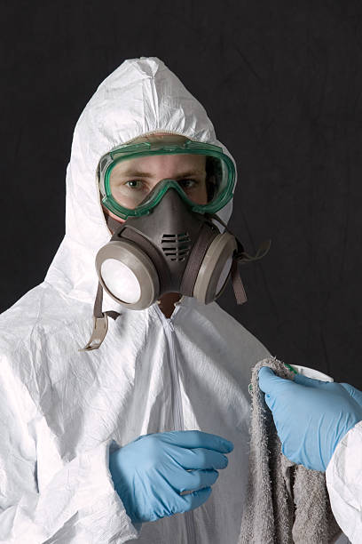 persönliche schutzausrüstung - radiation protection suit toxic waste protective suit cleaning stock-fotos und bilder