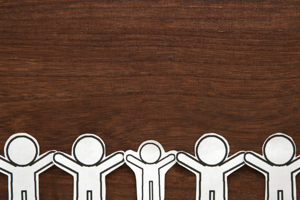 istock Human paper cut illustration vector on brown wood.  Teamwork concept. Social Network concept. 963123036