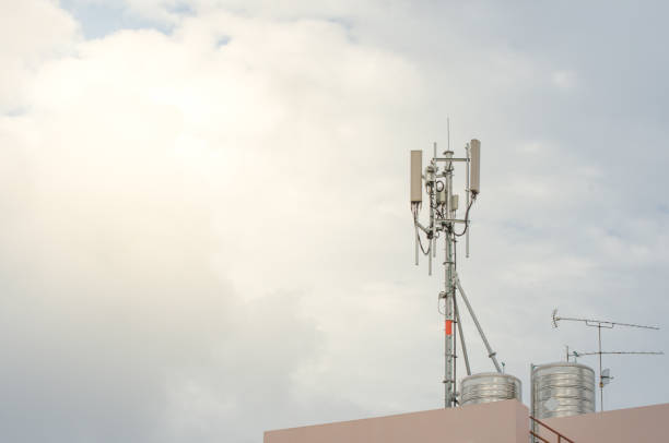 istock Telecommunication Tower. Cell Phone Signal Tower on sky background 963123054