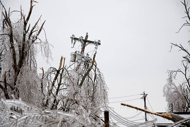 icy power pole falling - winter storm bildbanksfoton och bilder
