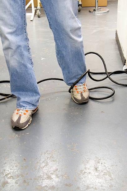 Tripping on an Electrical Cord stock photo