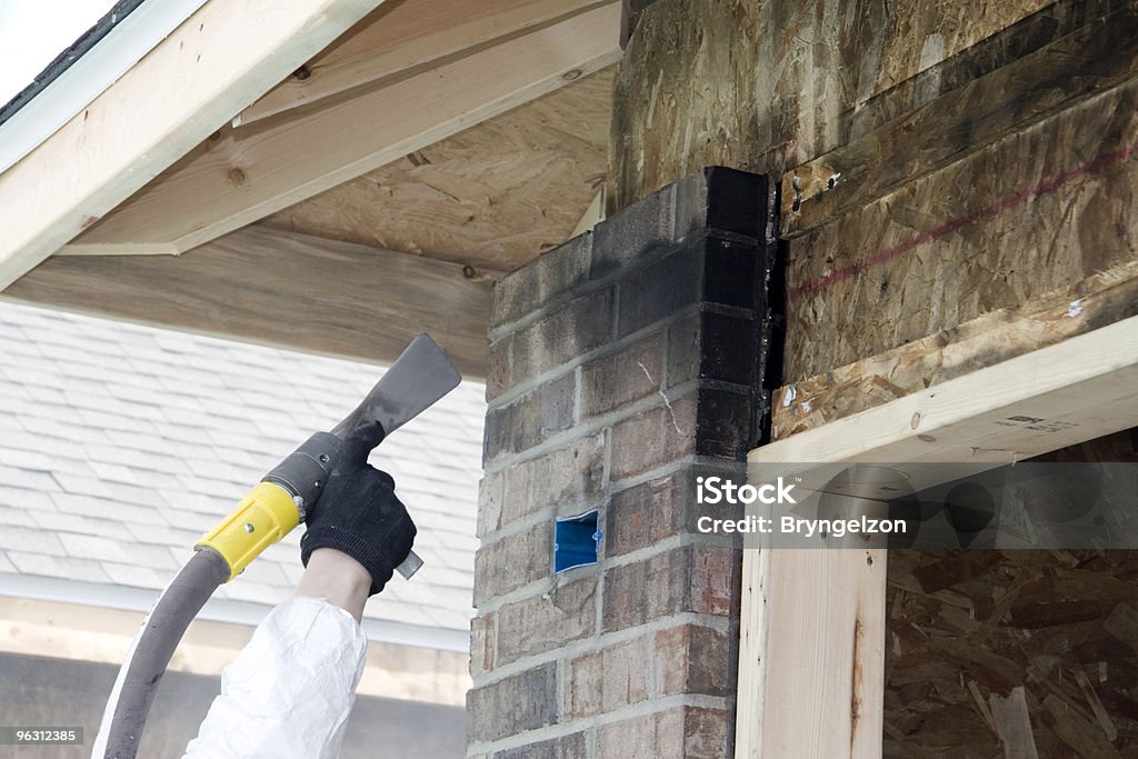 Cleaning Smoky Bricks  Damaged Stock Photo