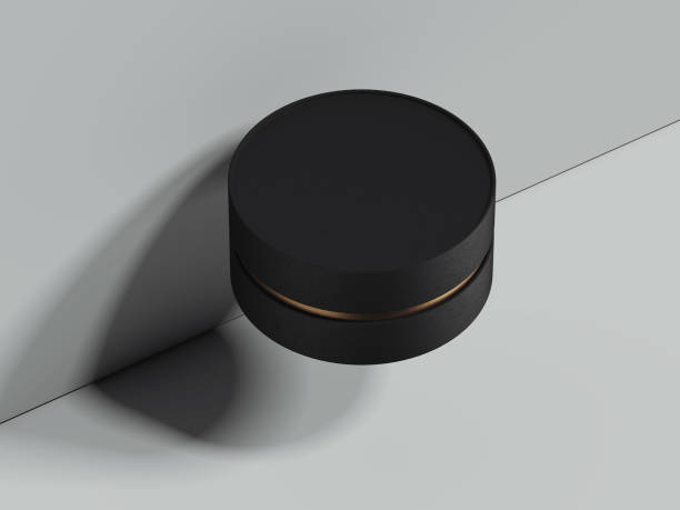 istock Black realistic round box next to the grey wall. 3d rendering 963126306