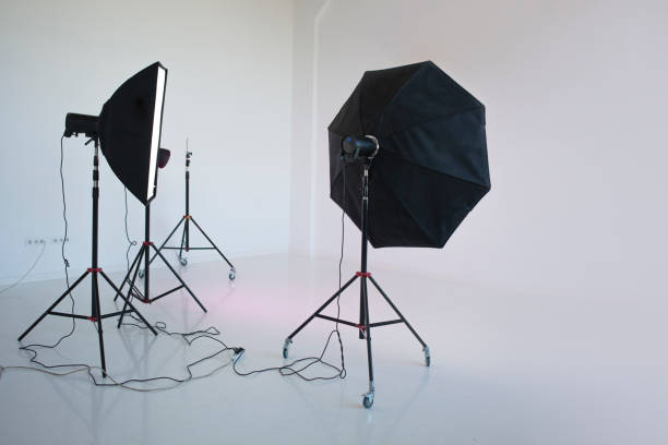istock An empty photo Studio with  white cyclorama, photo equipment is ready to shoot. 963126320