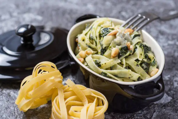 Freshly Prepared Tagliatelle with Spinach, Pine Nuts and Gorgonzola Cheese