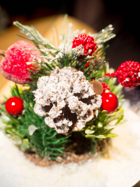 istock Christmas Winter composition with cinnamon sticks, fir tree, red berry 963131242