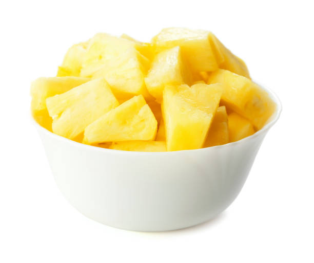 istock heap of sliced cubes of pineapple 963131354
