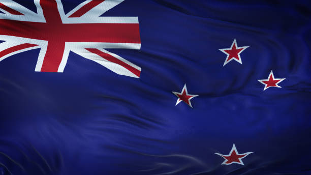 istock NEW ZEALAND Realistic Waving Flag Background 963131854