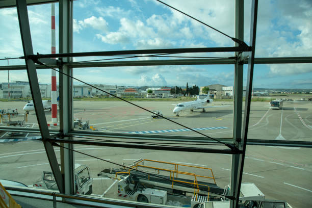 istock Airplane parked at airport terminal 963133282