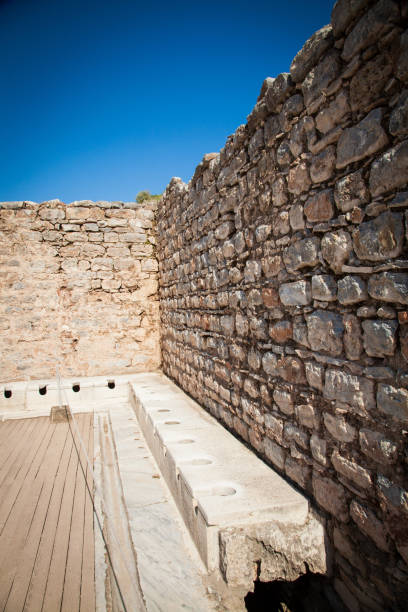 public toilet scholastica baths ephesus turkey - toilet public restroom ephesus history imagens e fotografias de stock