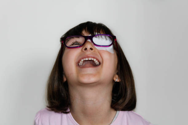 istock Little girl with eye patch 963134014