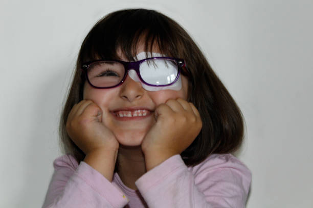 istock Little girl with eye patch 963135938
