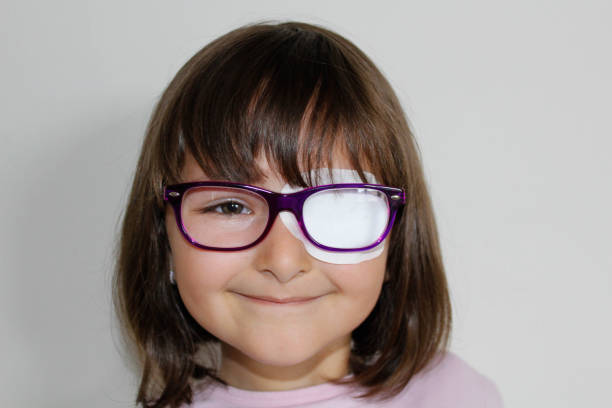 istock Little girl with eye patch 963135962