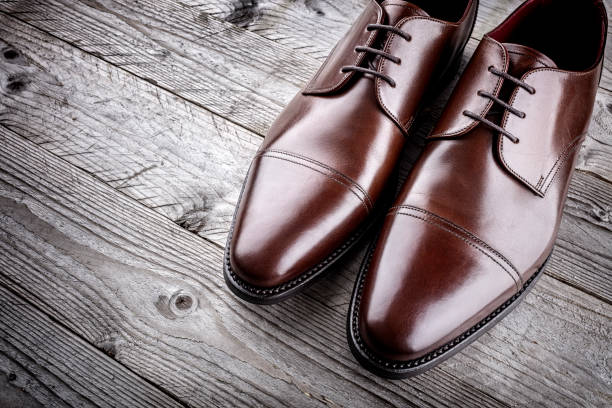 Classic formal brown leather shoes Classic formal brown mans handcrafted leather fashion shoes brogue photos stock pictures, royalty-free photos & images