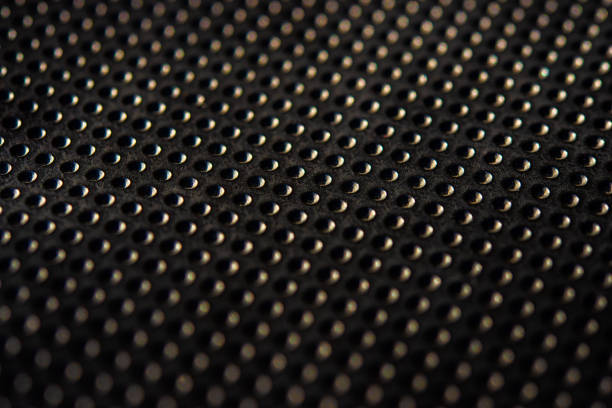 istock Black golden dotted texturised technological seamless fabric or surface closeup 963149762