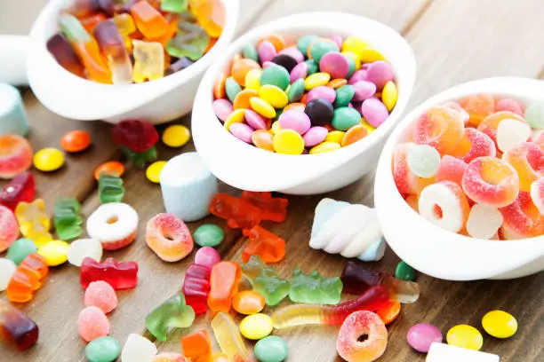 Colorful candies, jelly and marmalade in bowl