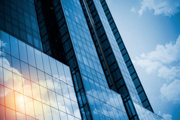 istock Skyscraper or modern building in the city with cloud and sunlight 963150896