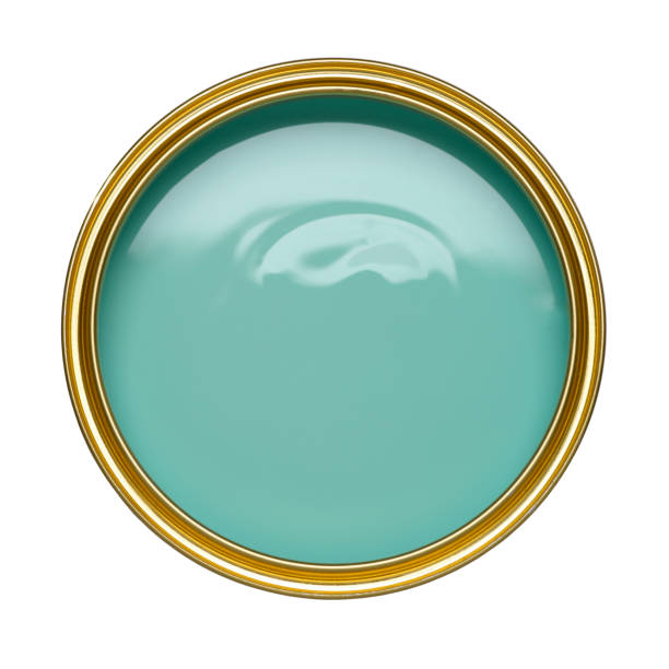istock TIN CAN OF TURQUOISE PAINT WITH LID REMOVED ON 963152726