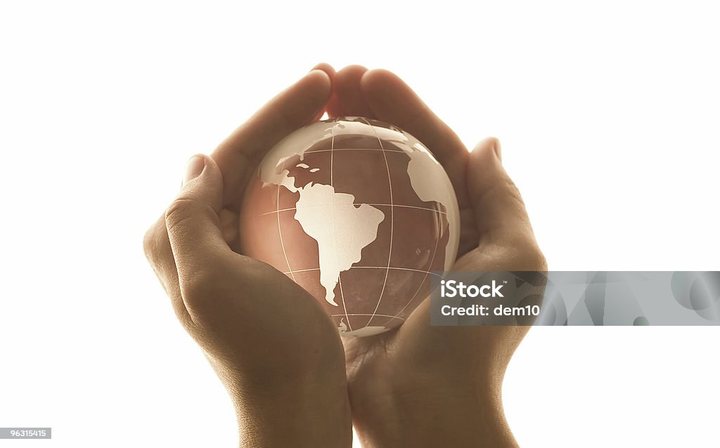Mundo em uma mão (High Key - Foto de stock de Globo terrestre royalty-free