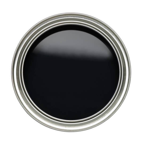 istock TIN CAN OF BLACK PAINT ON WHUTE BACKGROUND 963155208