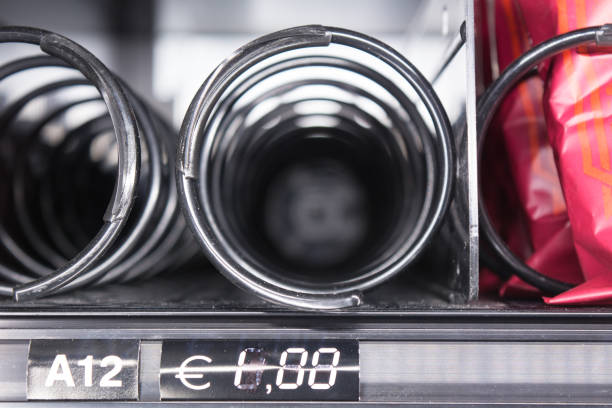 Horizontal View of Close Up of Empty Spirals inside the Snack Vending Machine on Blur Background