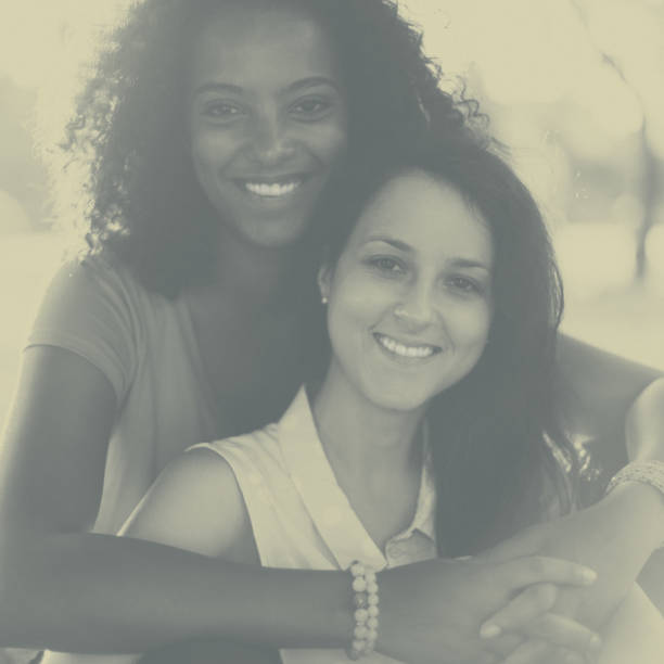Smiling mixed race girls together