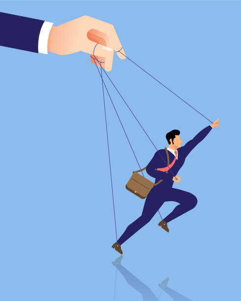 istock Business concept illustration of big hand and a businessman being controlled by puppet master. 963164344