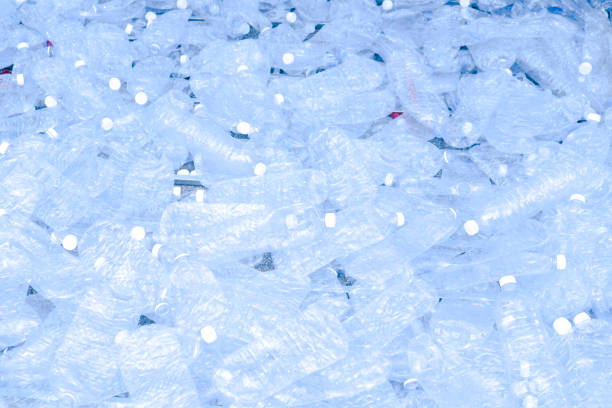 istock Composition with plastic bottles of mineral water. Plastic waste 963164364