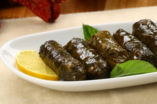istock Dolmades - stuffed grape leaves with rice and meat 963170446