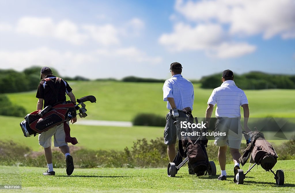 golfer friends three friends playing golf Golf Stock Photo