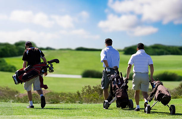 Golfista seus amigos - fotografia de stock