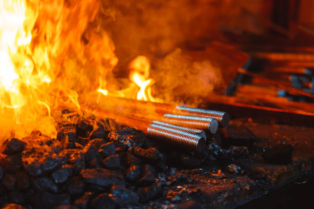 Fire in the furnace in the smithy, tools