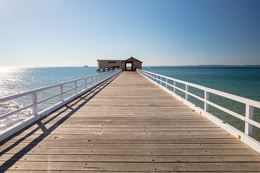 Queenscliff's iconic pier on a summer's day on the Bellarine Peninsula, Victoria, Australia